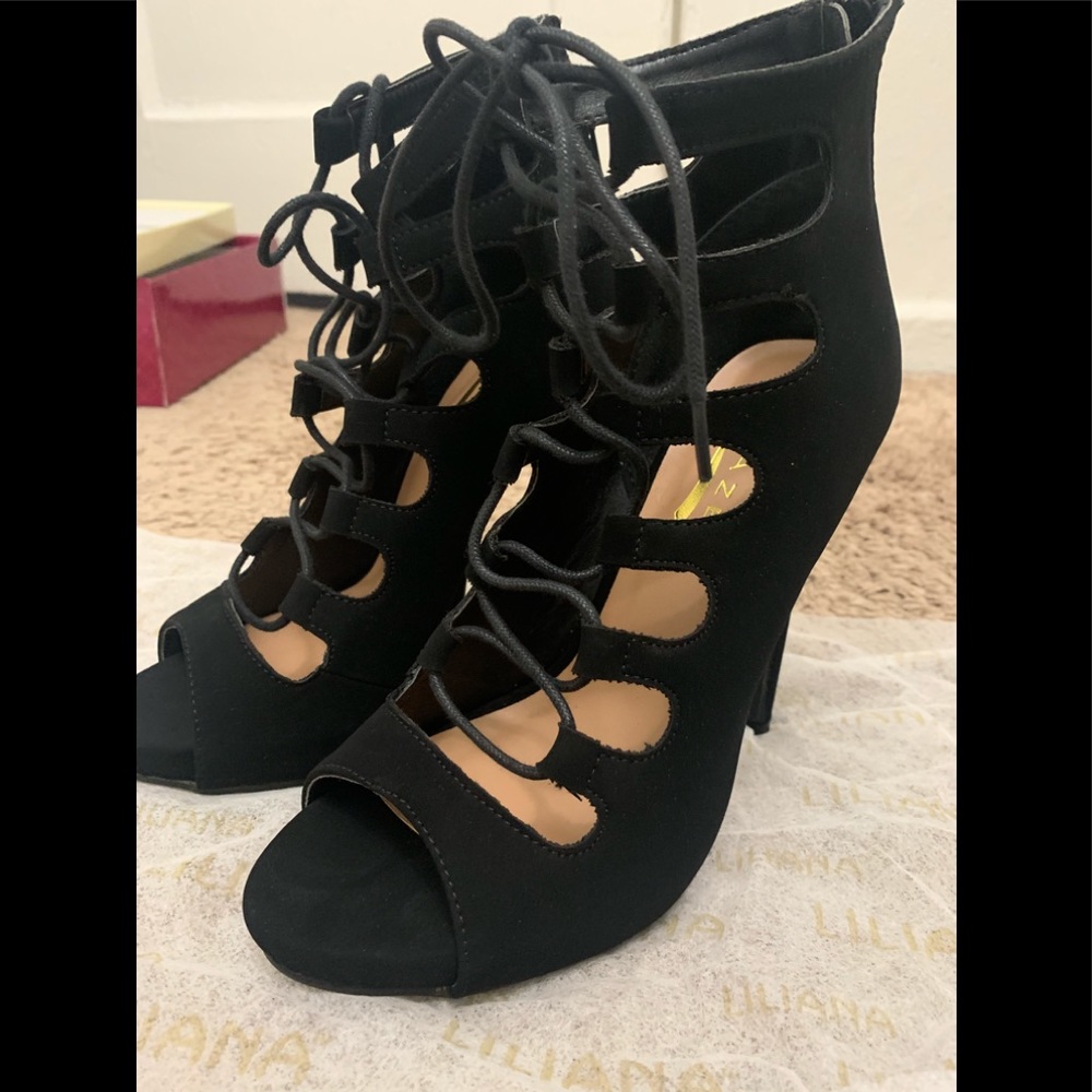 Never worn trendy black lace up heels